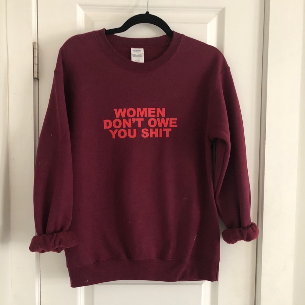Burgundy “women don’t owe you shit” crew neck